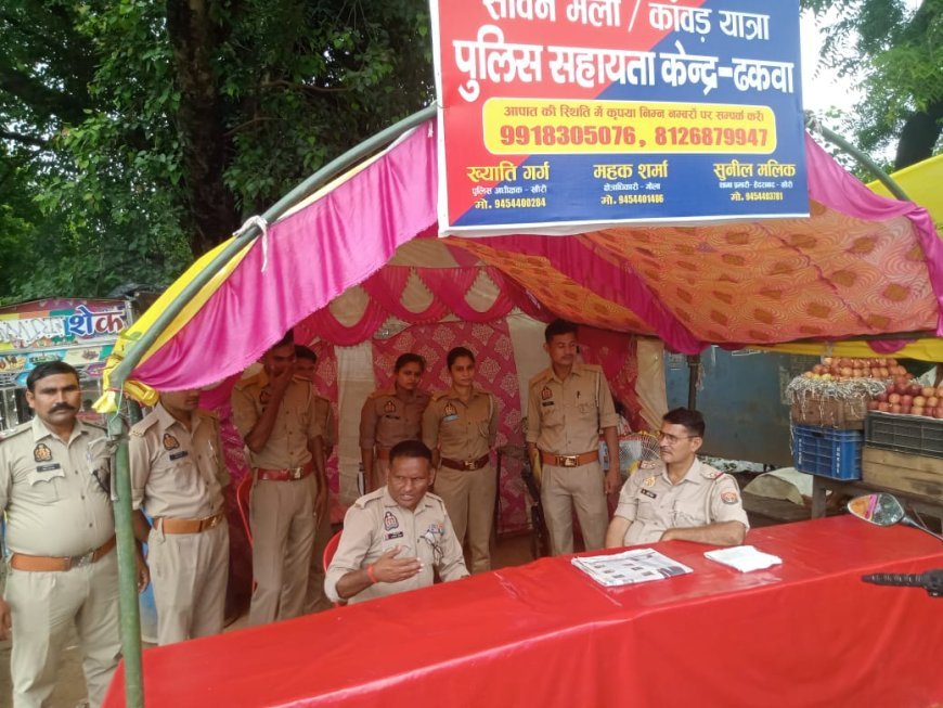 लखीमपुर खीरी : कांवड़ियों की सेवा में जुटे अरविंद फौजी, 10 हजार पानी पाउच बांटे; छालों पर कर रहे मरहम-पट्टी